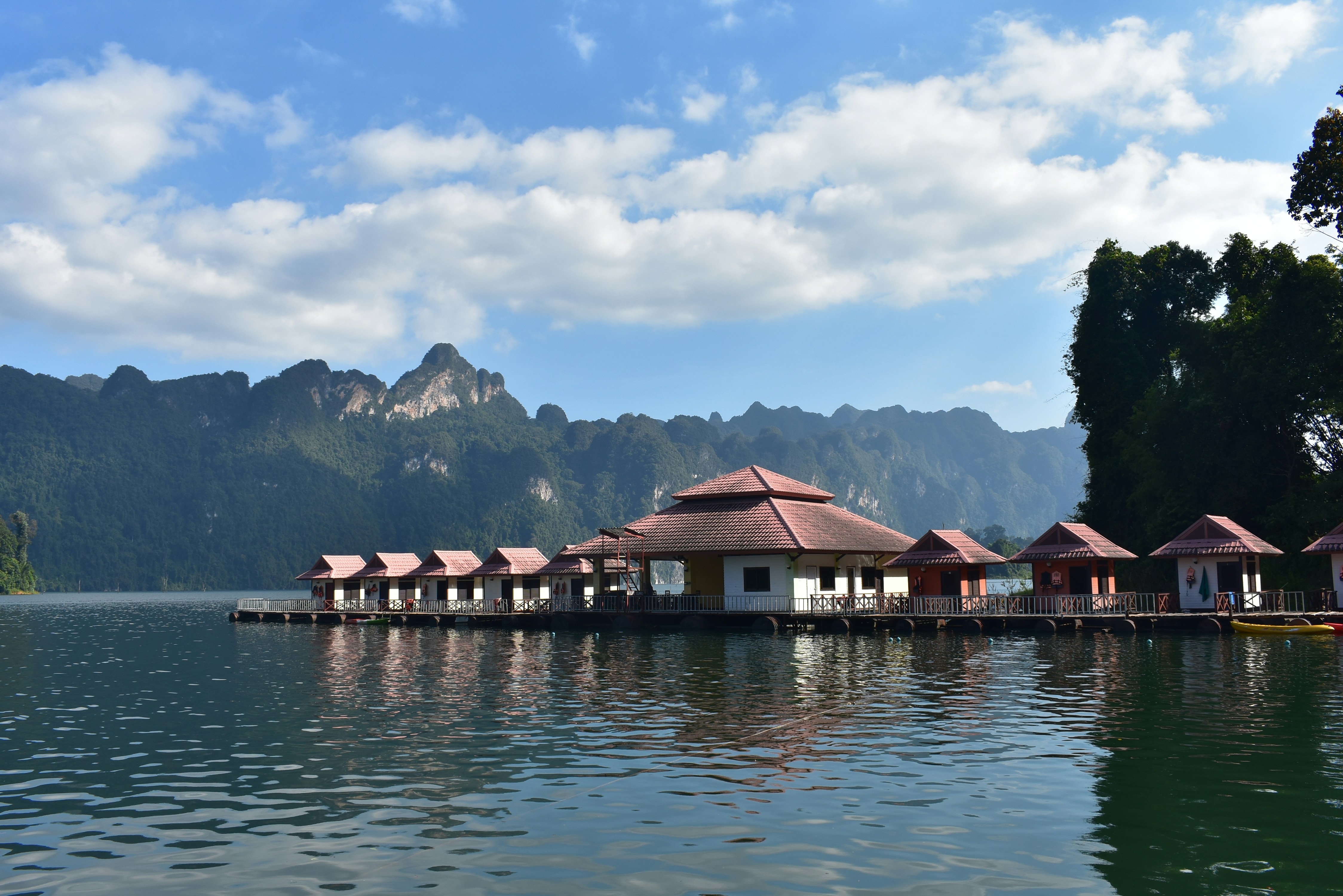 Floating bungalows on Cheow Lan Lake with limestone karst mountains, Khao Sok National Park, Thailand