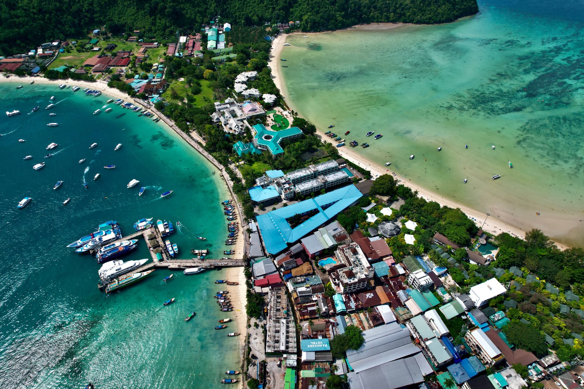 Aerial drone view of Ton Sai Village and turquoise sea, Koh Phi Phi, Krabi, Thailand