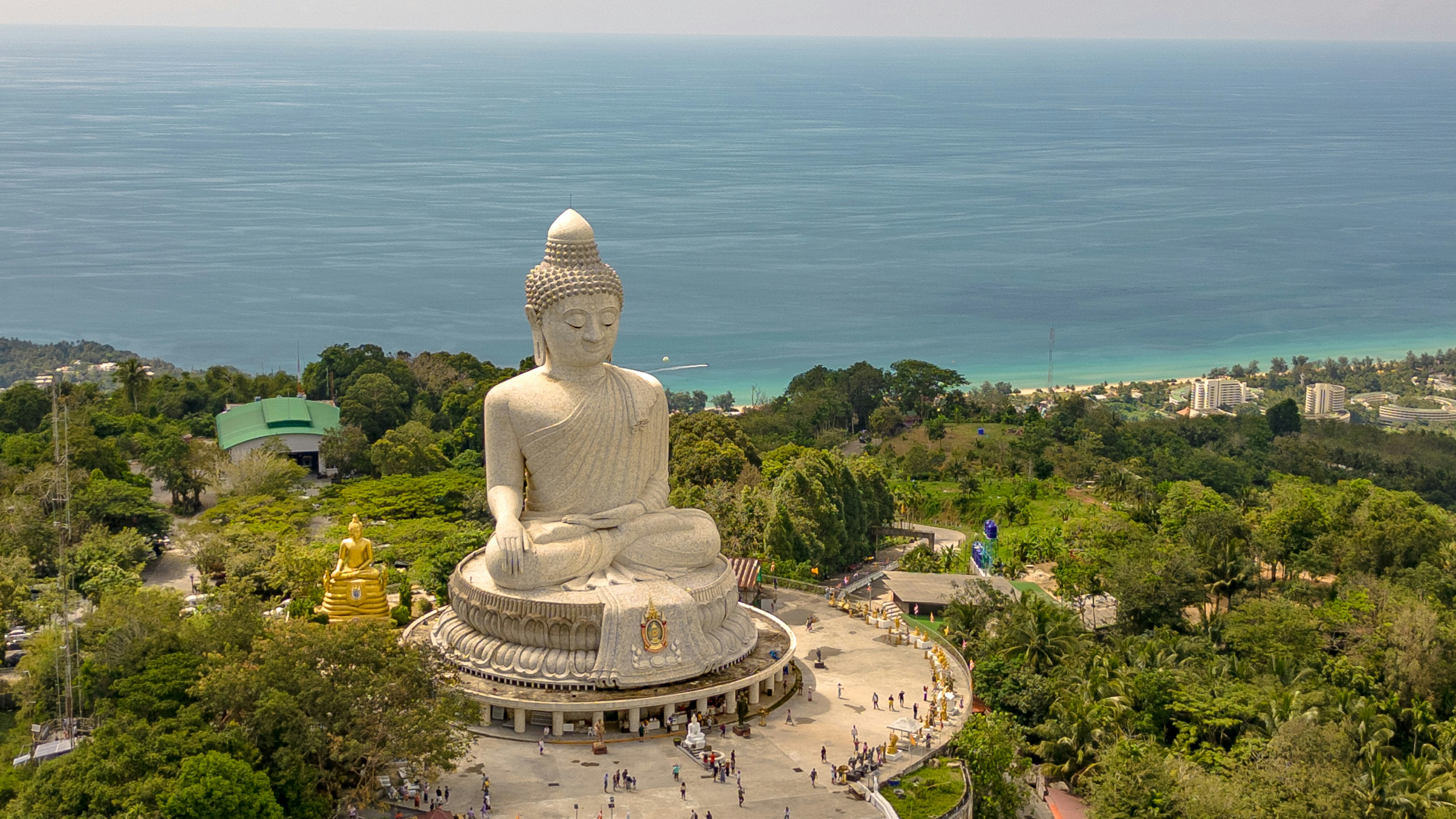 White Big Buddha statue overlooking the coastline from its hilltop perch, Karon, Phuket