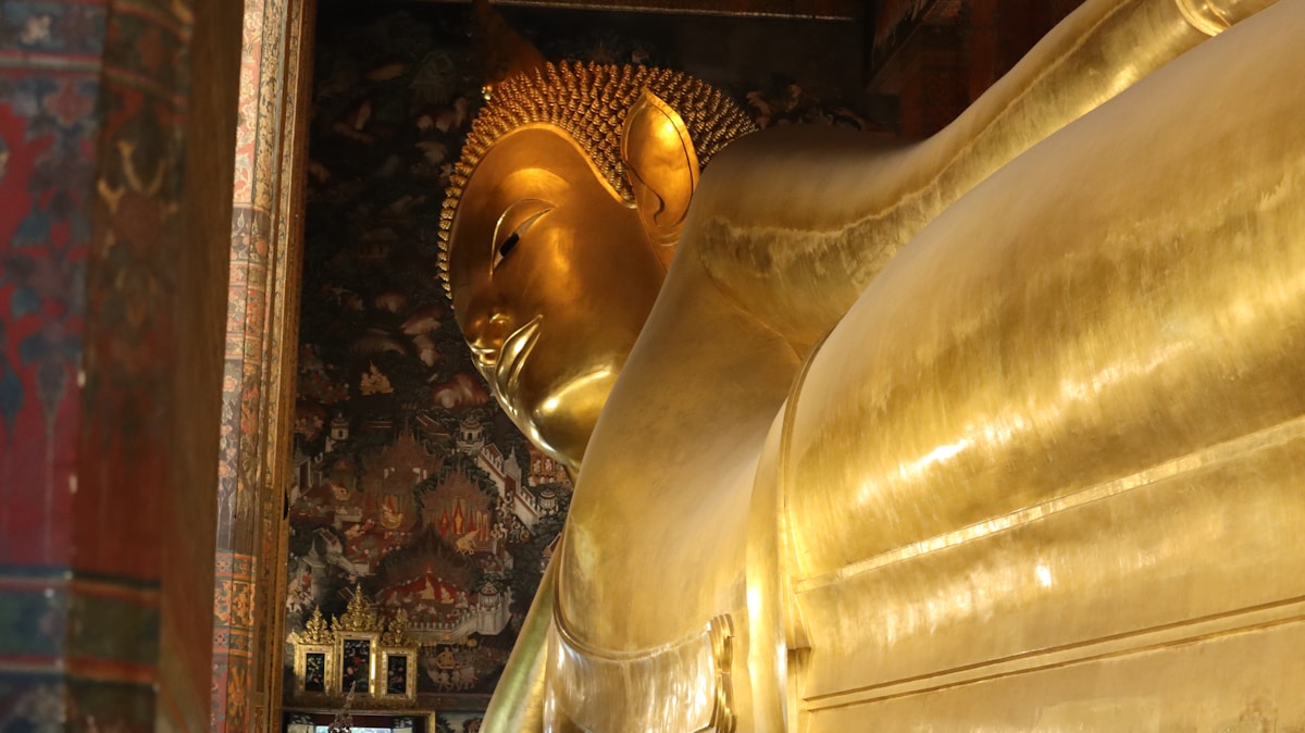 The golden Reclining Buddha at Wat Pho, Bangkok - 46 metres long, gilded in gold leaf