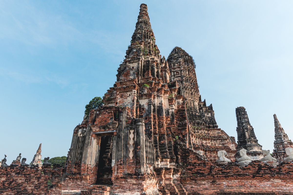 Ancient Khmer-style brick tower ruins at Wat Chaiwatthanaram in Ayutthaya, Central Thailand