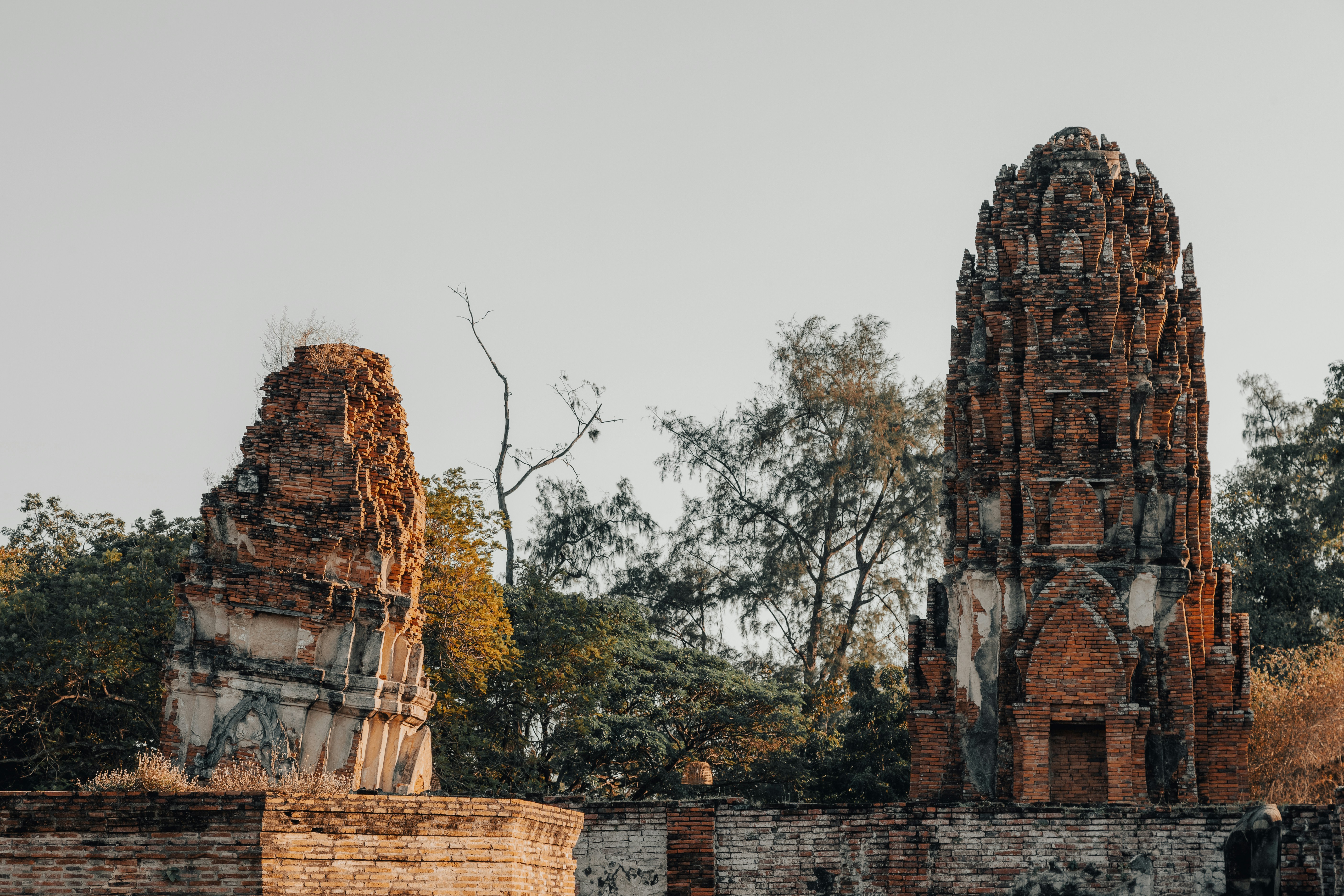 Ancient sandstone prangs at Wat Phra Si Sanphet rising above the Ayutthaya historical park