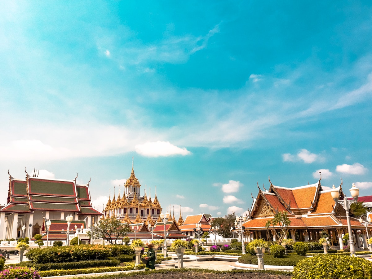 Orange temple spires and towers of Loha Prasat, Bangkok, Thailand