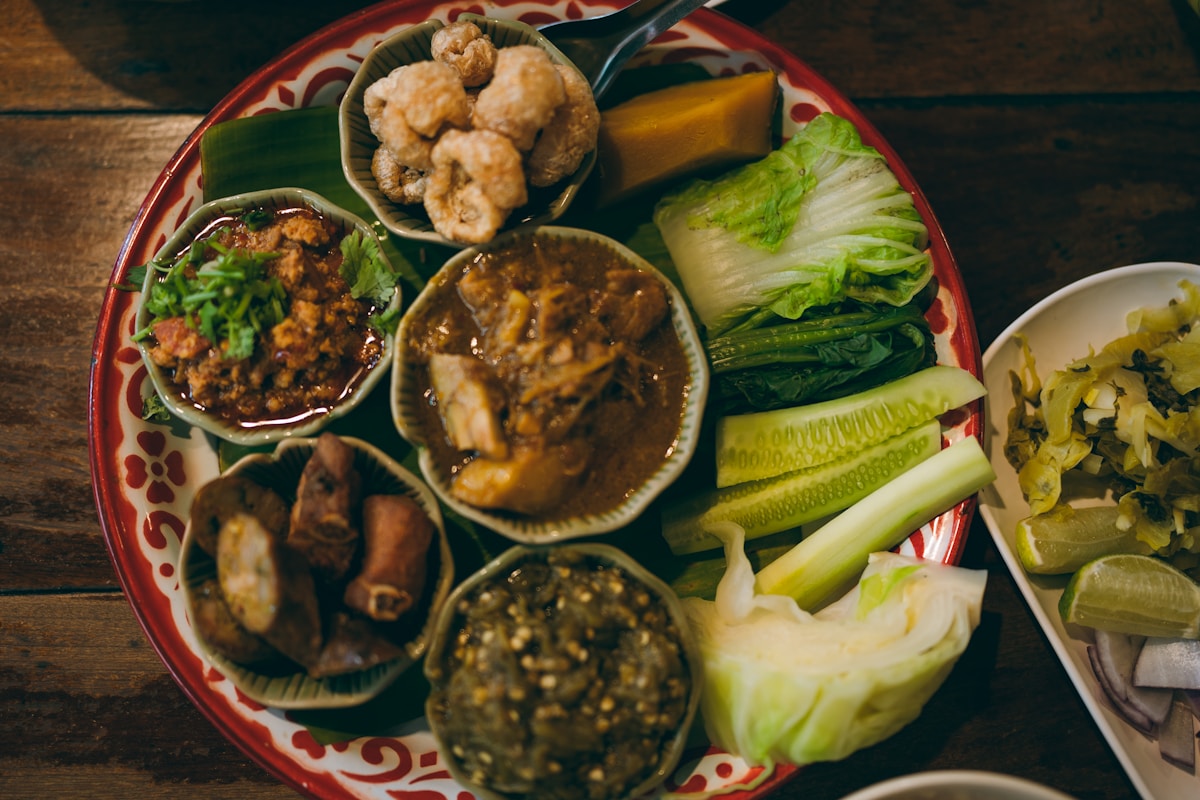 Thai cooking class ingredients and wok on outdoor kitchen counter, Chiang Mai