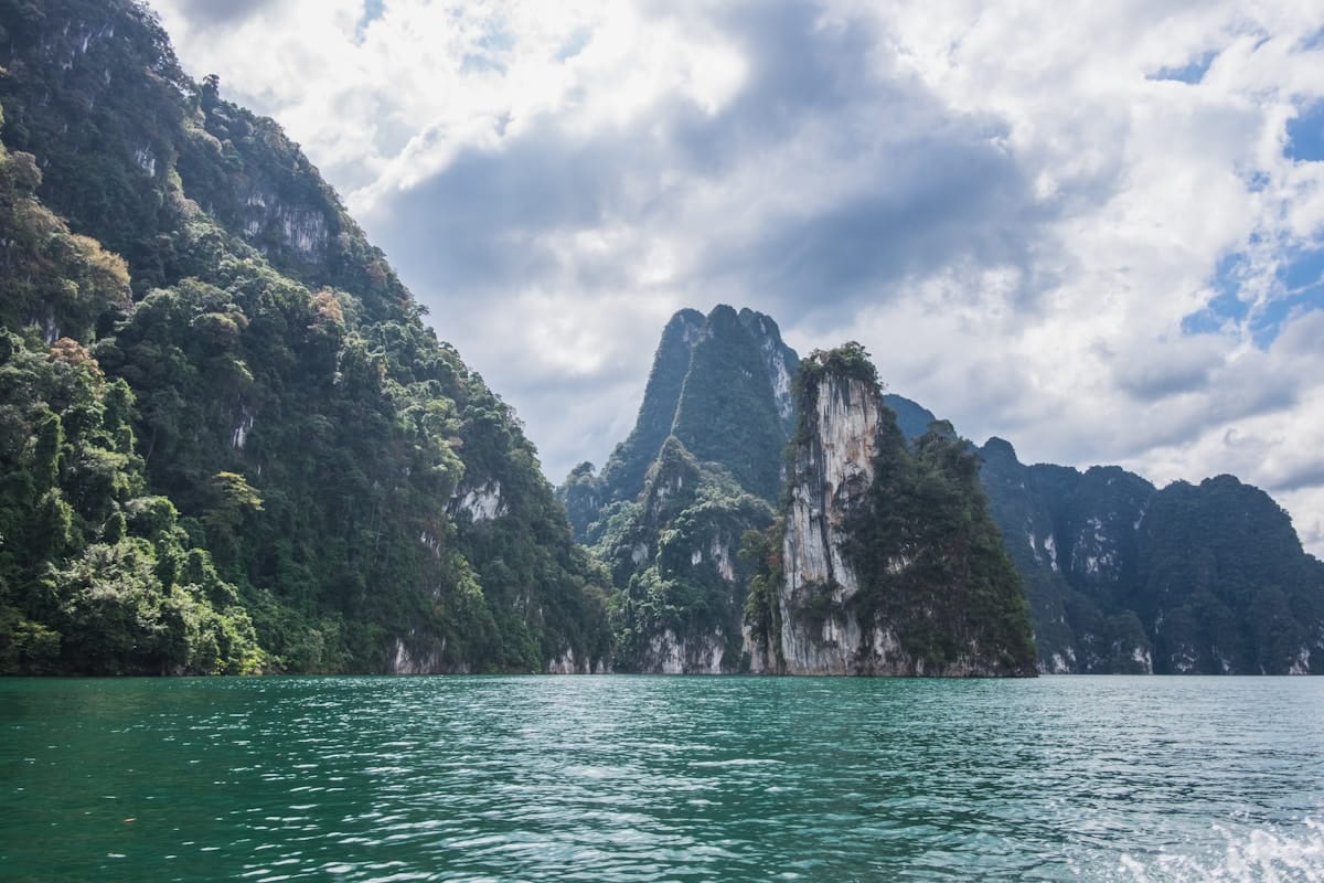 Jungle river with limestone cliffs in Khao Sok National Park, southern Thailand