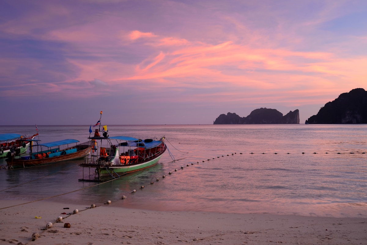 Longtail boat on clear water off Trang's Andaman coast, southern Thailand