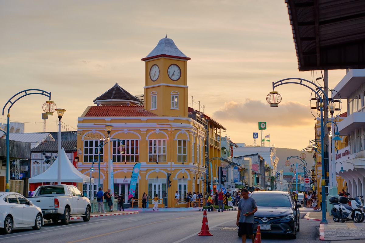 Phuket Old Town clock tower street at sunset with Sino-Portuguese architecture