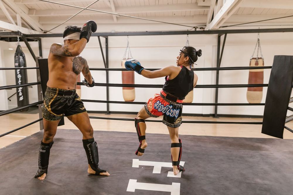 Muay Thai sparring in a ring