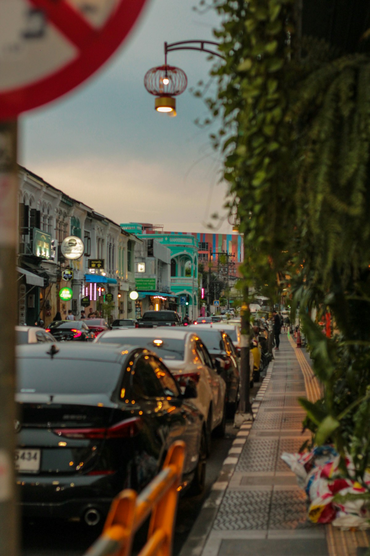 Phuket Old Town street with Sino-Portuguese shophouses and tuk-tuk