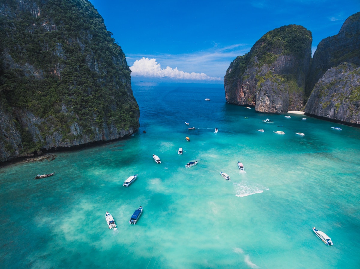 Aerial view of turquoise Maya Bay surrounded by limestone cliffs, Koh Phi Phi, Krabi, Thailand