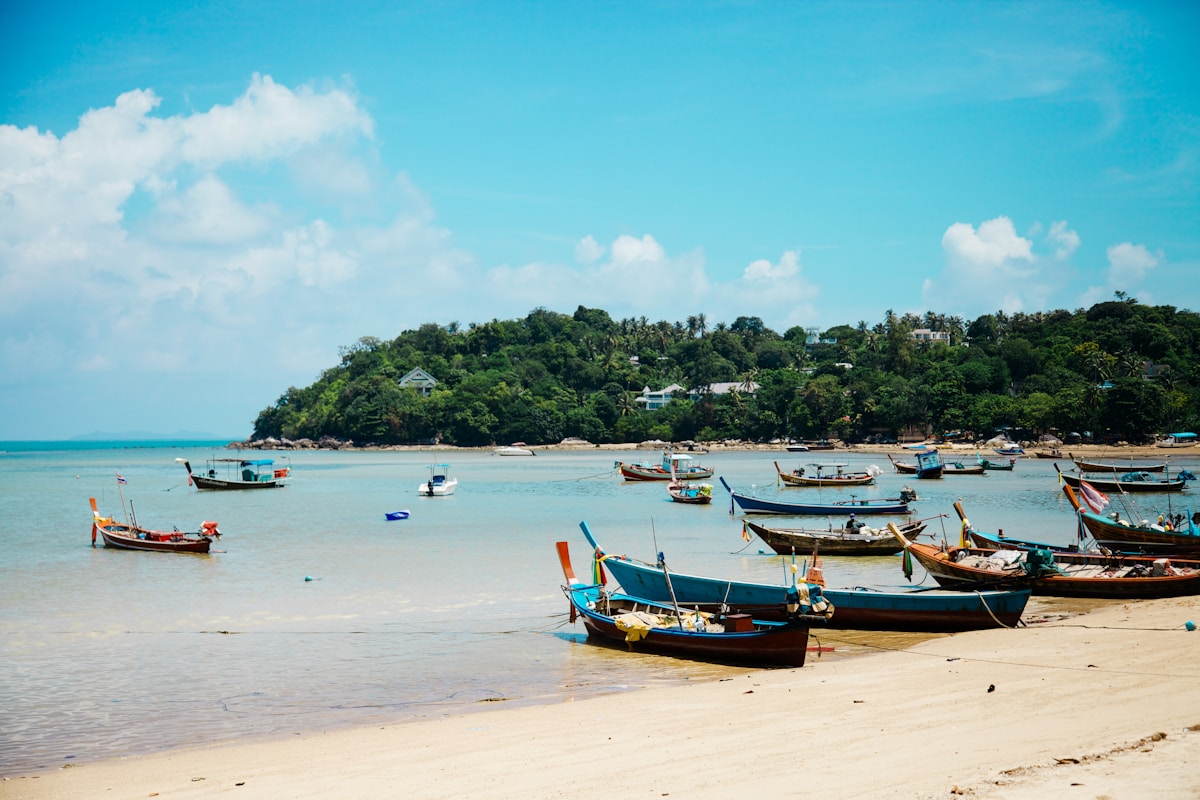 Traditional longtail boats on the shore, Ko Samui, Gulf of Thailand