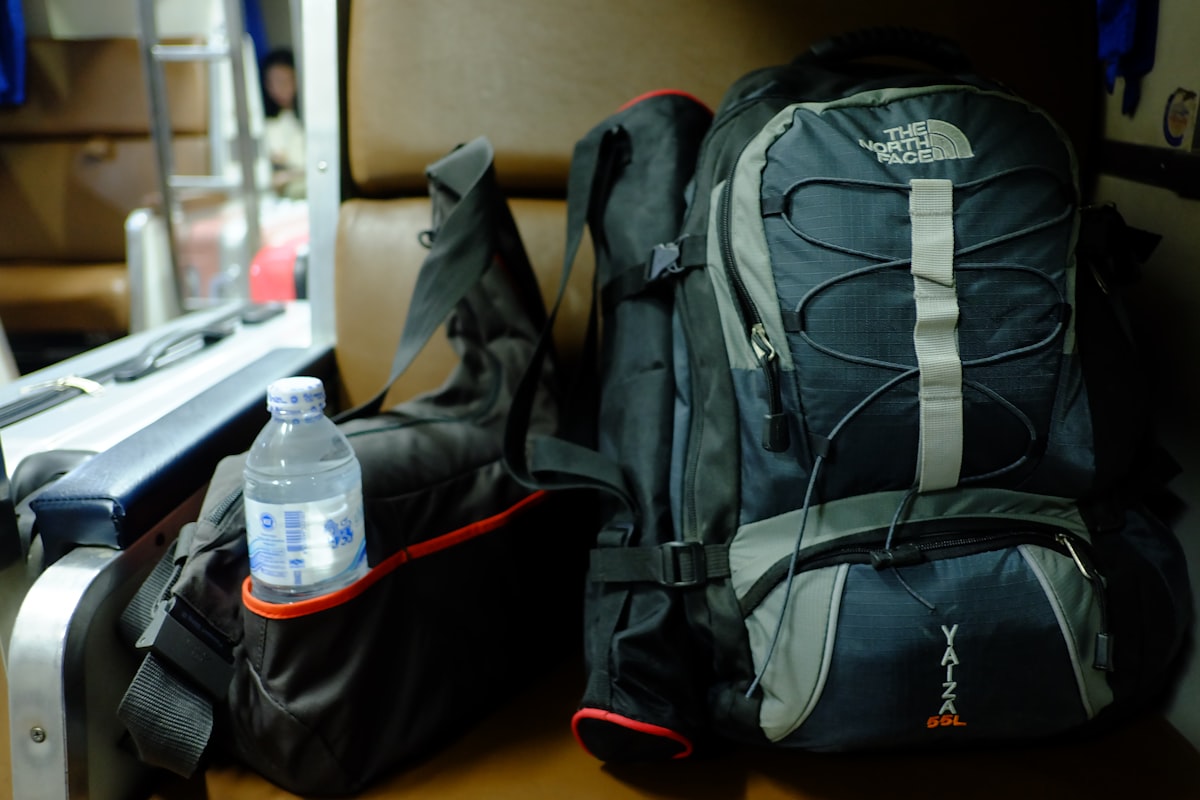 North Face backpack and travel bags on an overnight bus in Bangkok, Thailand