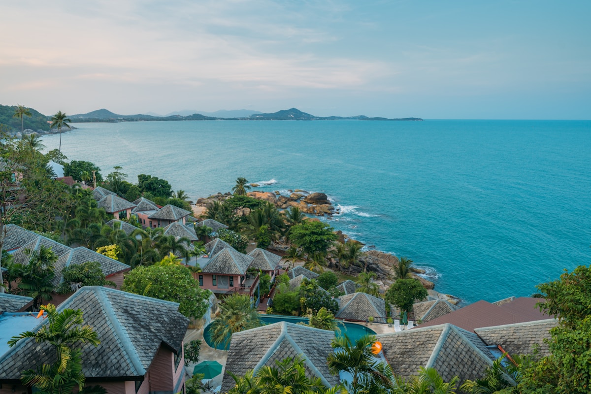 Resort villas on Koh Samui hillside above the Gulf of Thailand — November