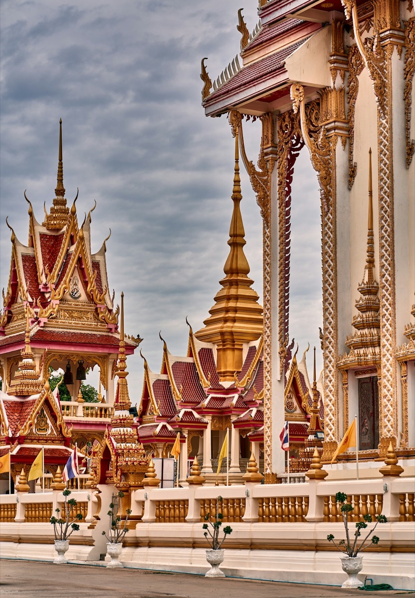 Golden temple with ornate towers and spires, Khon Kaen, Thailand