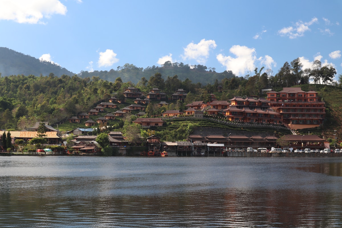 Chinese-style village at Ban Rak Thai on a misty lake surrounded by mountains, Mae Hong Son province